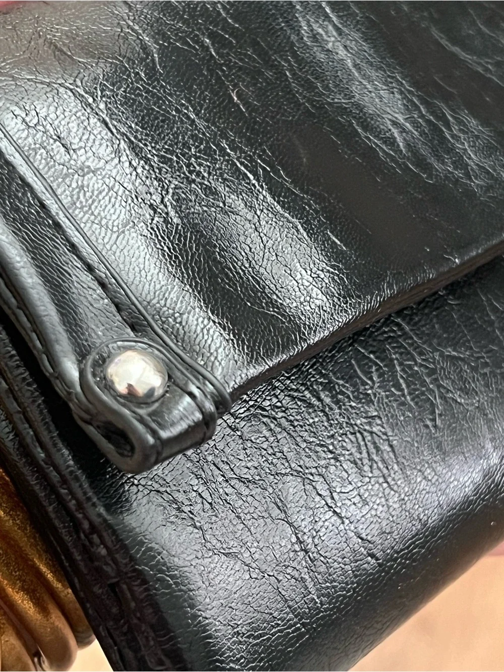 Black Fold-Over Clutch Wallet new without tags. Never used. Genuine leather